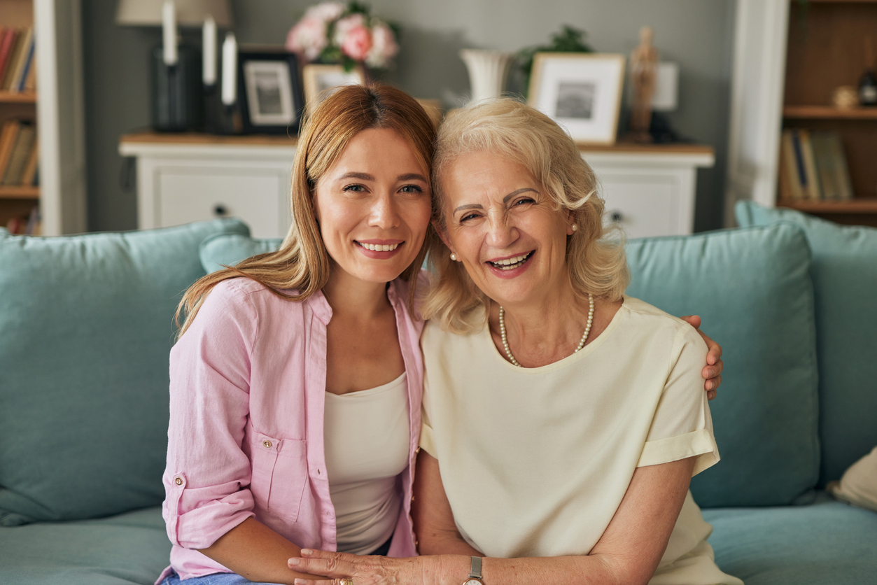 A mother and daughter sitting together at Traditions at Camargo.