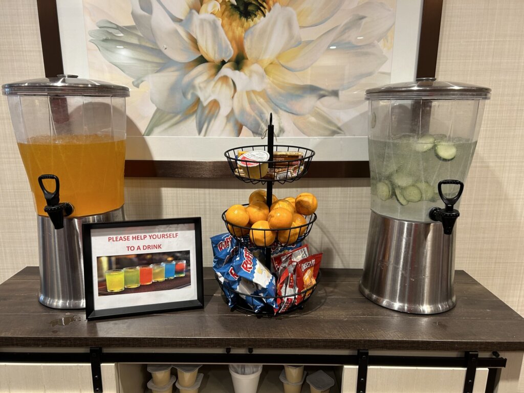 A close-up of the hydration station with chips and oranges at Traditions of Camargo
