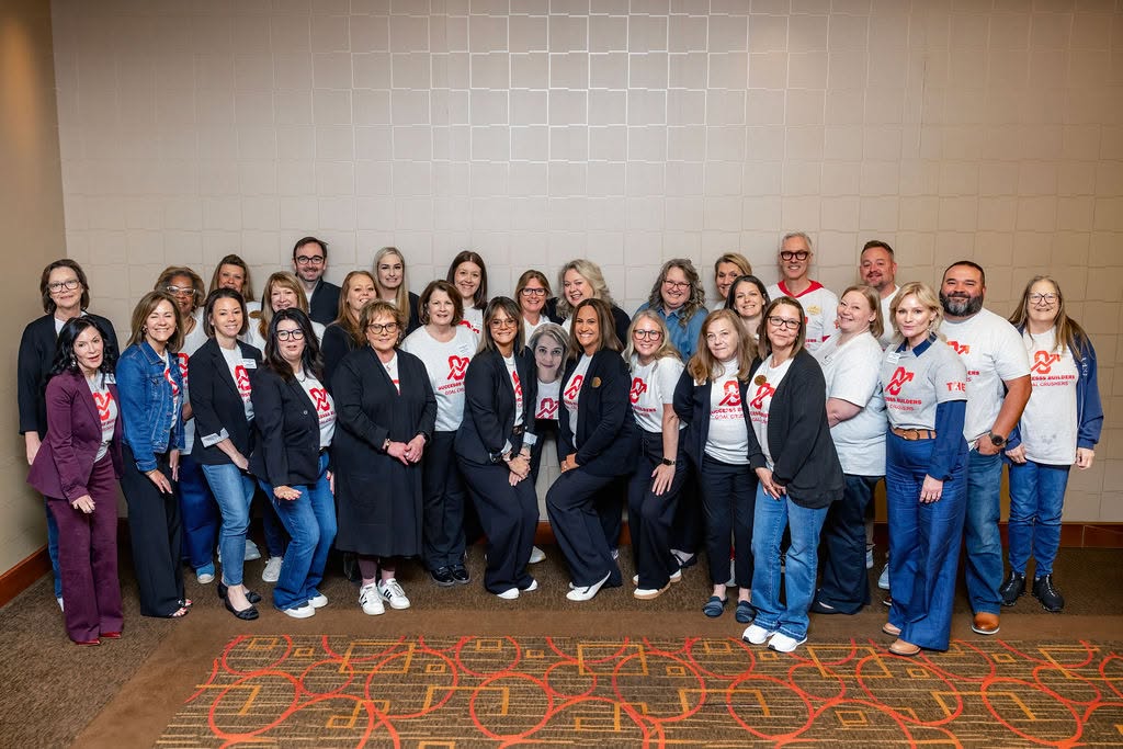 Group of Traditions employees during the annual company meeting